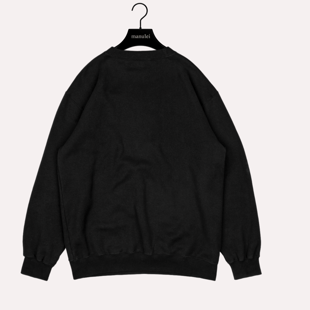 Manulei black sweatshirt back view